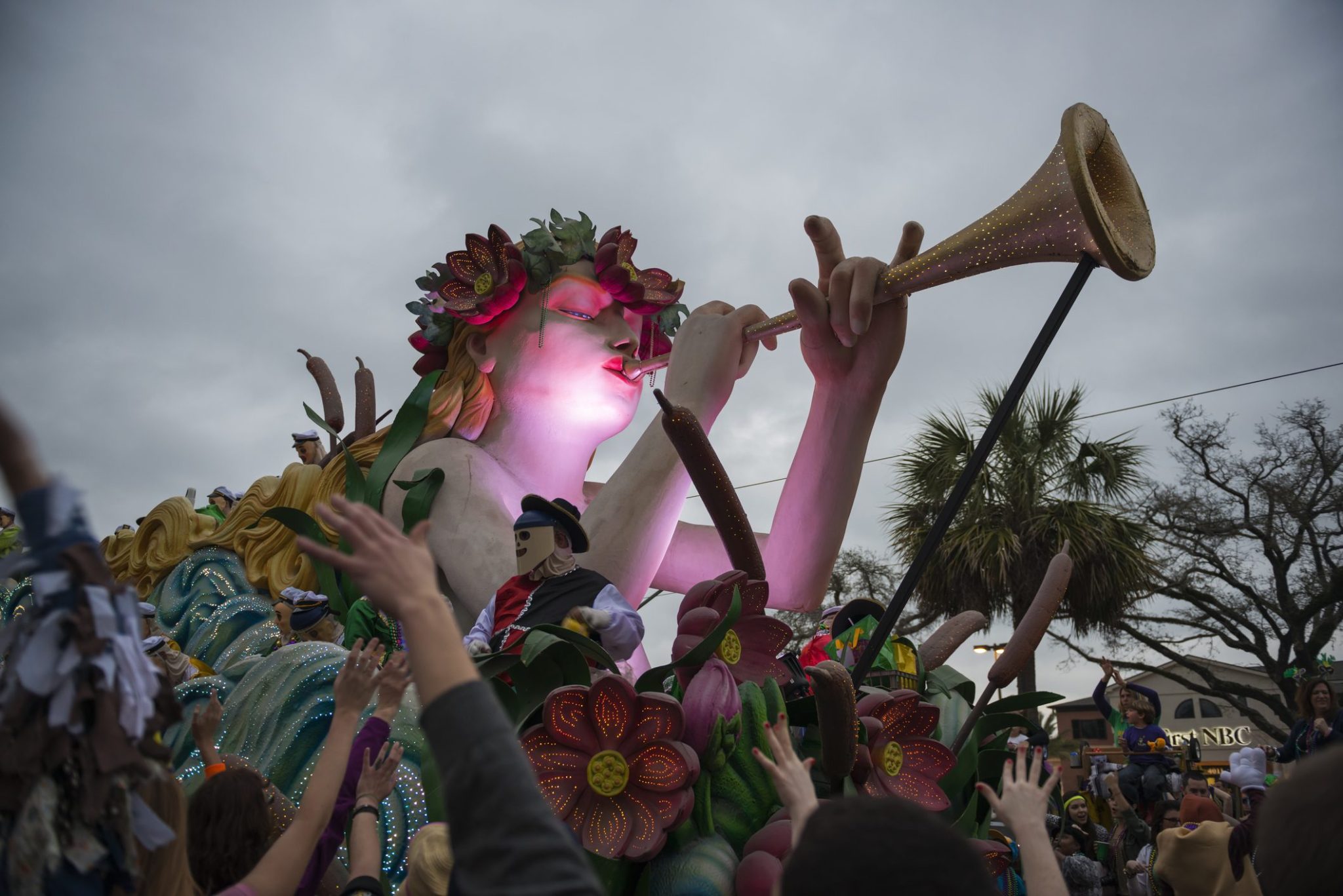 New Orleans, Louisiana, USA - February 9, 2013: An ornately decorated float belonging to the Krewe of Endymion passes through a crowd on Canal Street during Mardi Gras.