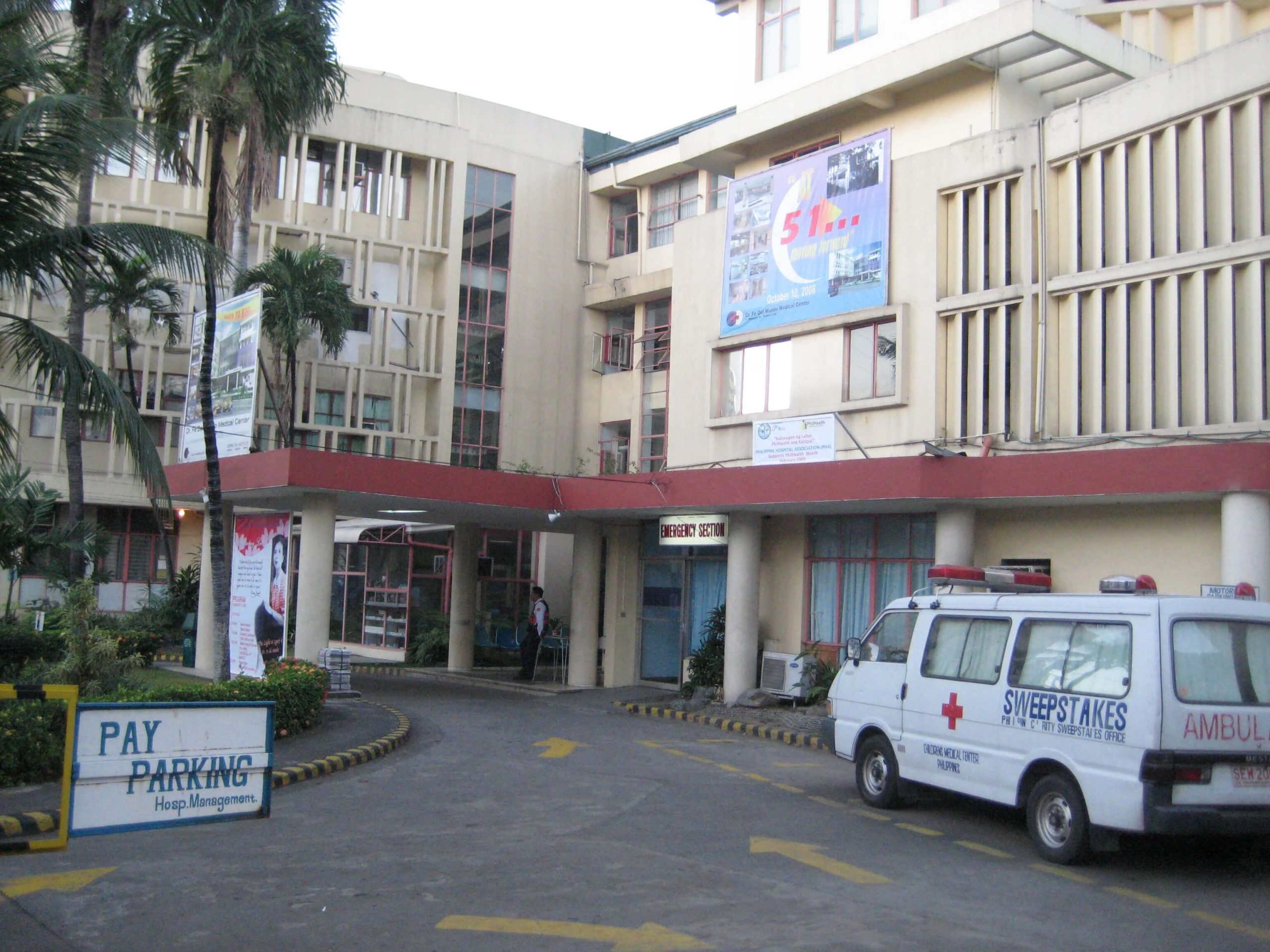 Hospital Building with Ambulance
