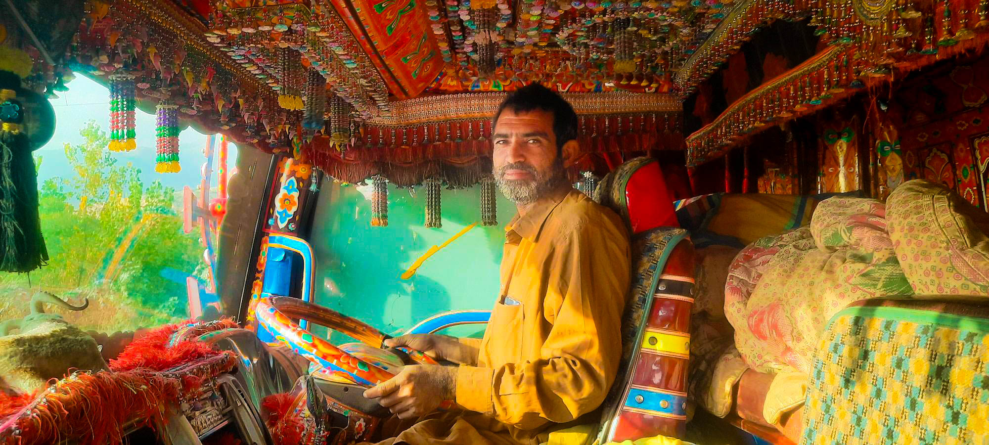Interior view of the truck with brightly colored garland decorated.